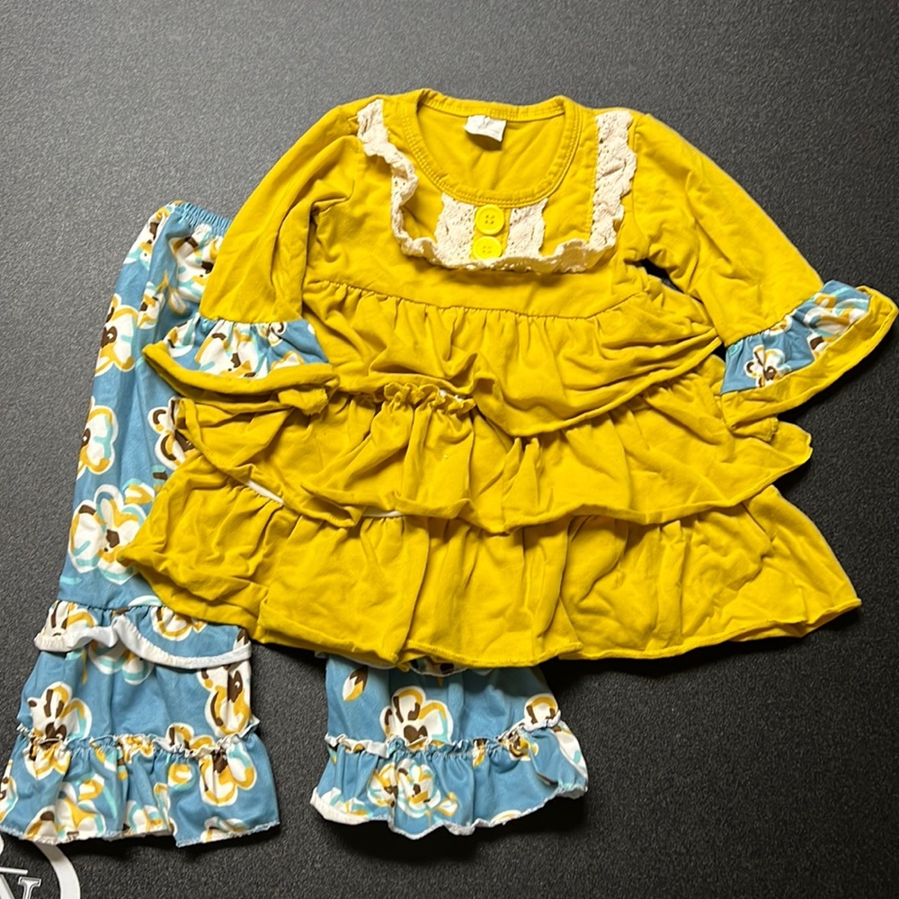 Girls 2 piece outfit.  Bell bottom & ruffle shirt